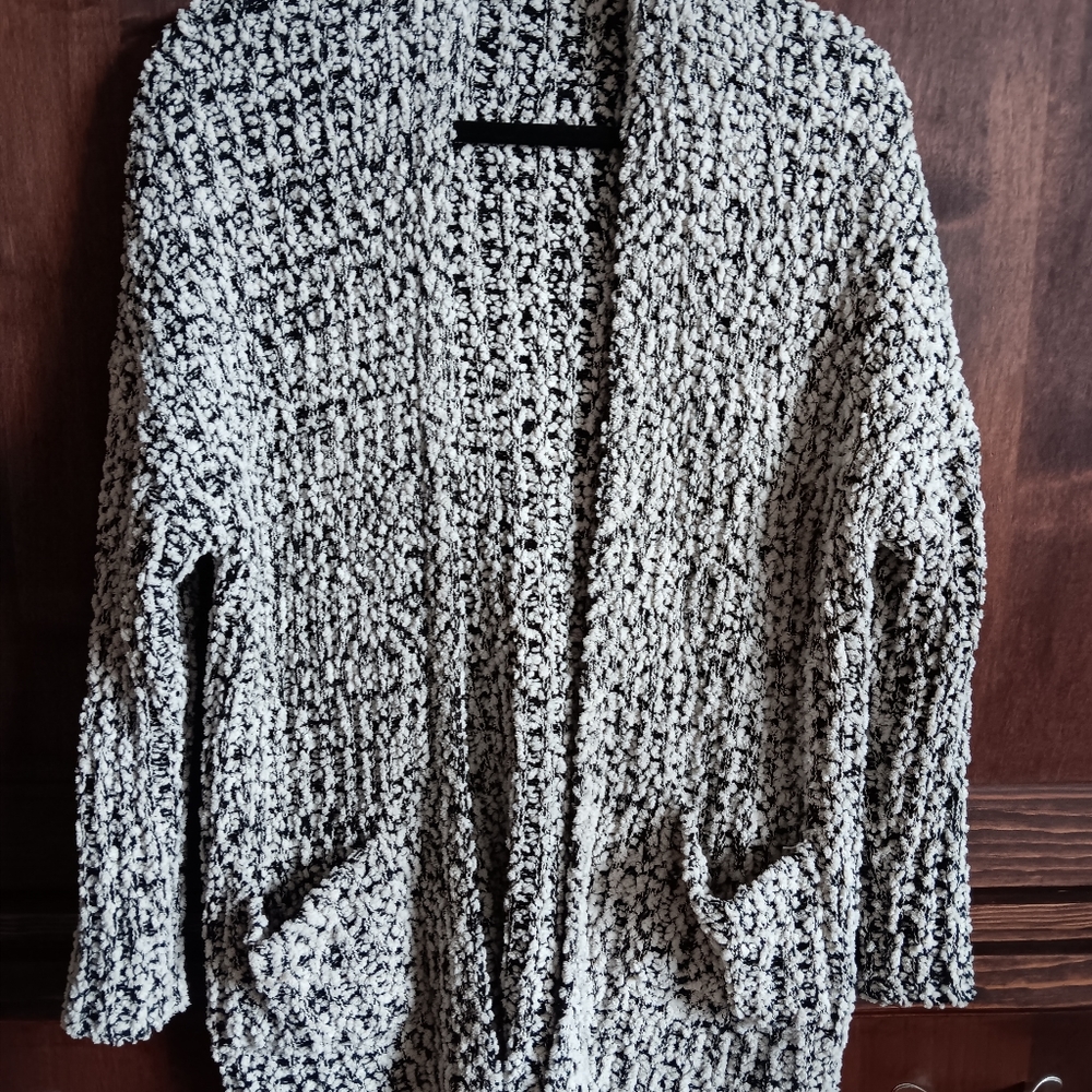 Soft creamy white and black cardigan style sweater